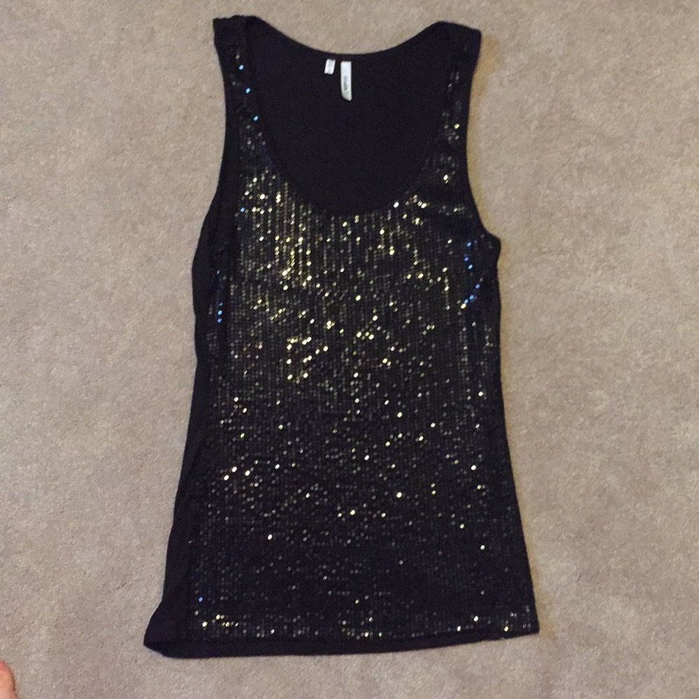 Maurice’s black tank with gems on front